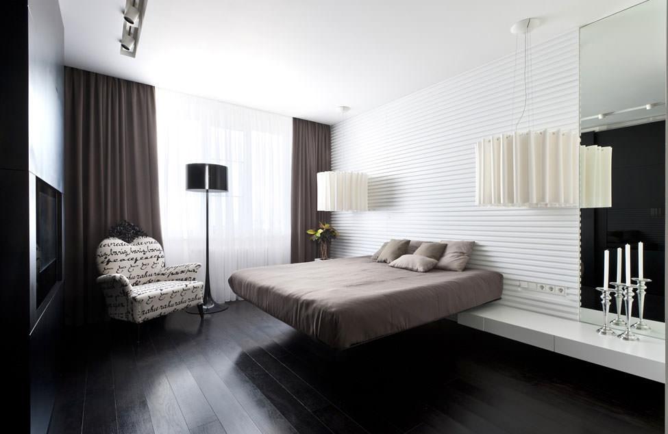 Черный пол с белыми фактурными стенами и потолком в спальне