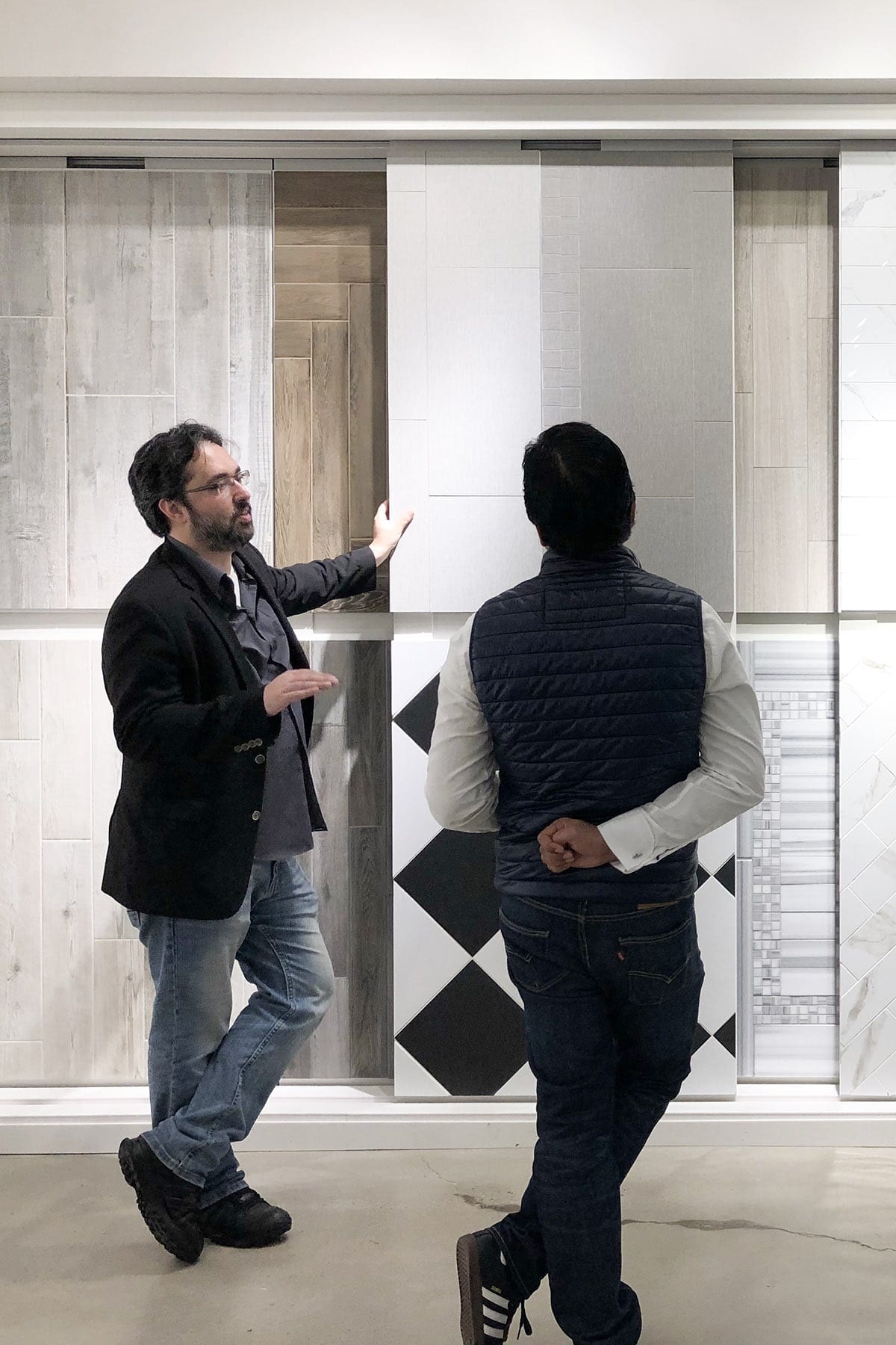 Architect Jorge Fontan and client at a showroom