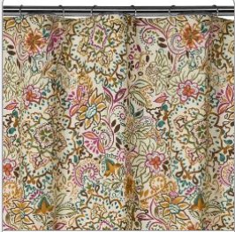 This Shakira shower curtain is new at Target - you can see how putting this into a pink-tiled bathroom would give you numerous possibilities to use other strong accent colors to draw attention away from the pink tile. And it