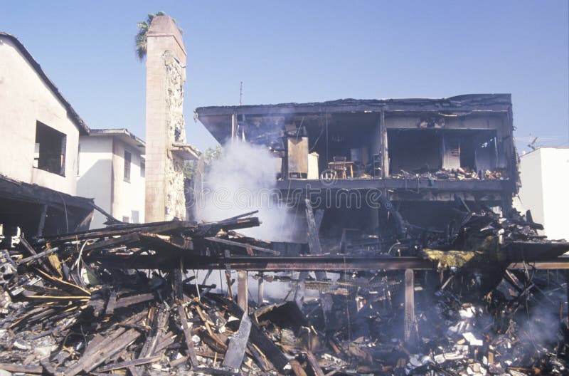 An apartment building on fire as a result of the Northridge earthquake in 1994 stock photos