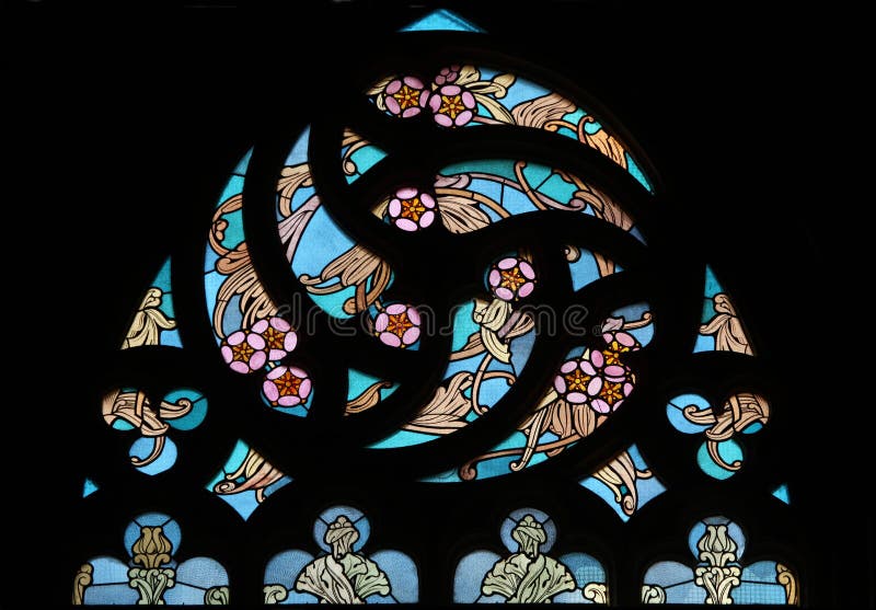 Art Nouveau floral pattern. Stained glass window. Art Nouveau floral pattern. Stained glass window in Saint Barbara Church in Kutna Hora, Czech Republic stock photo