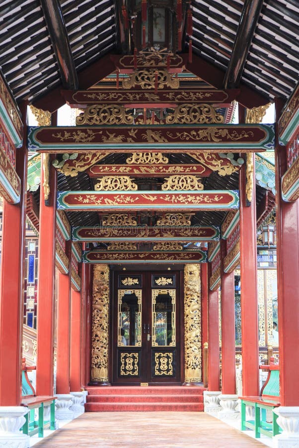 Chinese corridor front door. Asian Chinese traditional classic long corridor and front door in oriental classical style in ancient garden, China Asia stock photos