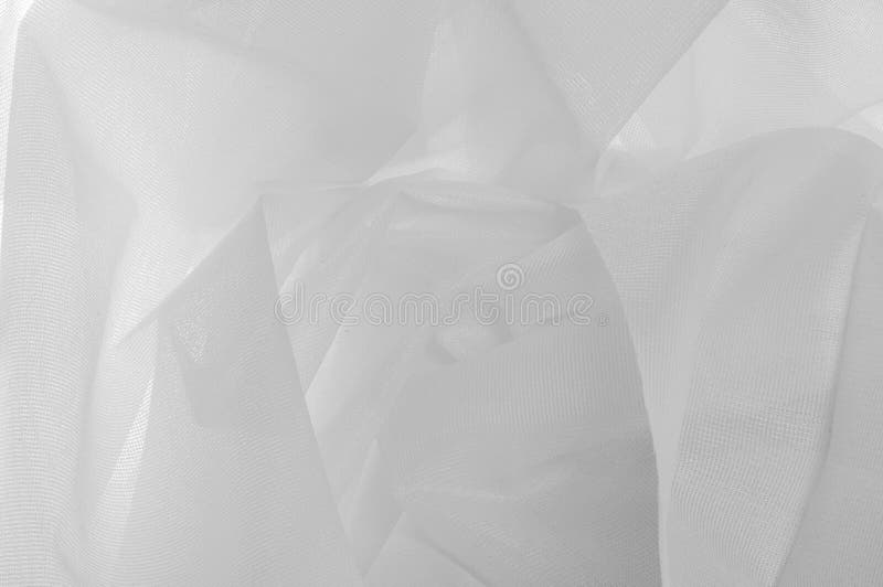 background texture, white wide nylon tulle. Enjoy the views of t royalty free stock image