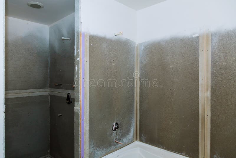 Bathroom finishing new apartments. Repair and installation of plumbing, faucets, water and sewerage. stock photography