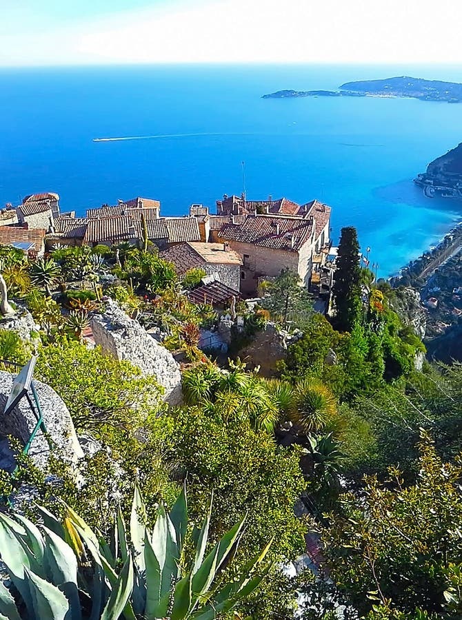 Beautiful view of the village of Eze, a botanical garden with cacti, aloe. Mediterranean, French Riviera, Cote d`Azur, France royalty free stock photos