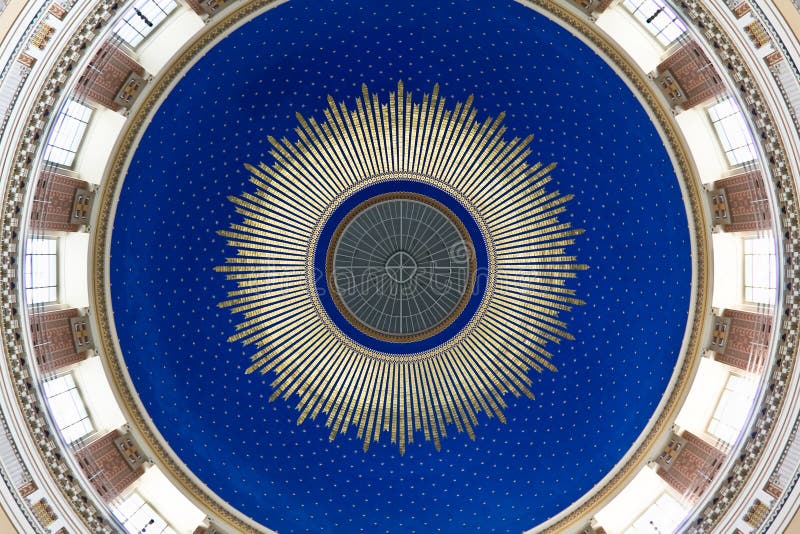 Blue cupola of an art nouveau church. With golden parts stock images