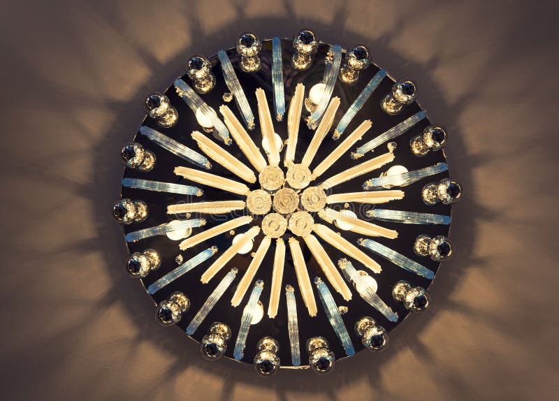 The bottom view image of the chandelier in the style of Art Nouveau. Unique classical empire chandelier royalty free stock photography