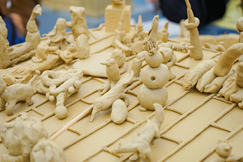 Children`s plasticine figurines at the master class on modeling of plasticine royalty free stock photo