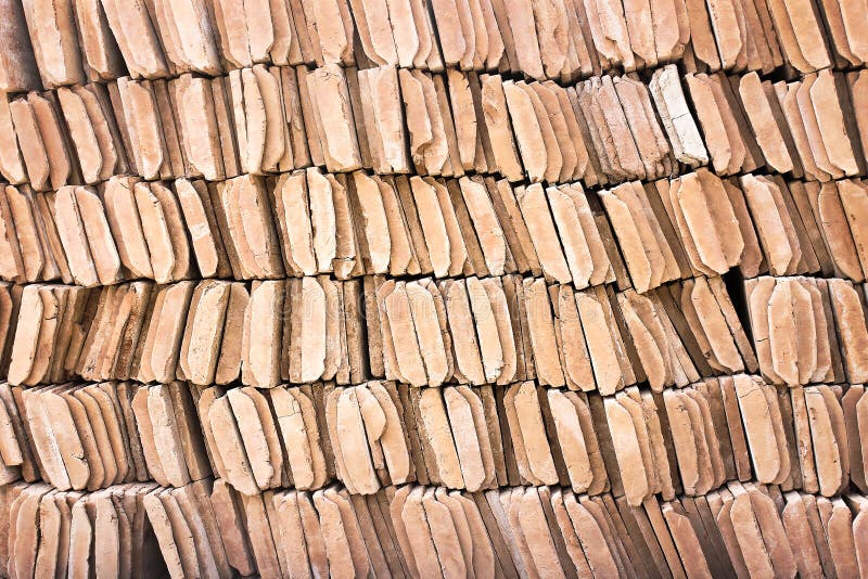 Row of brown clay roof tiles patterns texture or background. Close up Row of brown clay roof tiles patterns texture or background stock photos