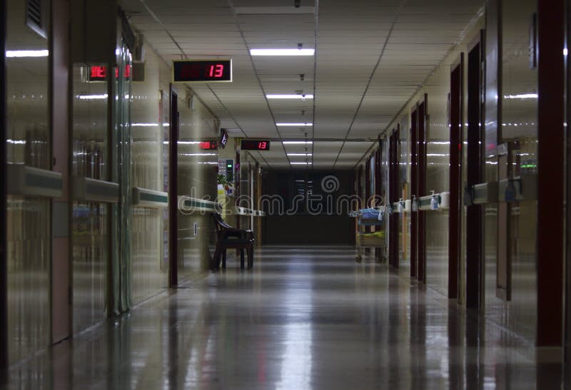 The corridor of the hospital. In the middle of the night is quiet, eerie, empty, jumping on the screen ` 13 stock image