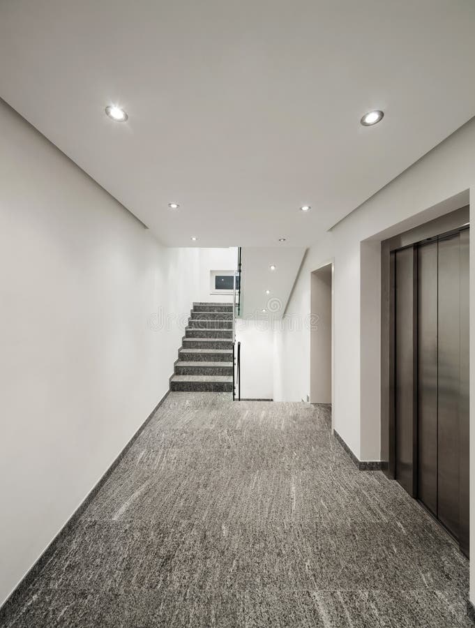 Corridor of a modern apartment building. Interior of a modern apartment building, corridor with elevator royalty free stock images