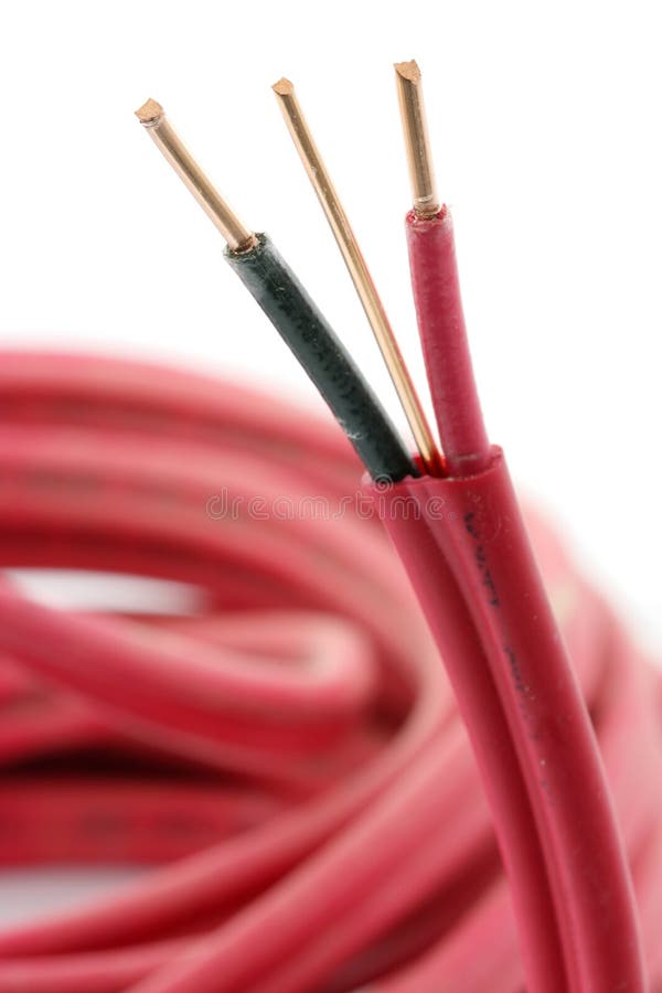 Electrical Wires. Macro of an insulated cable, with focus on the copper strands royalty free stock images