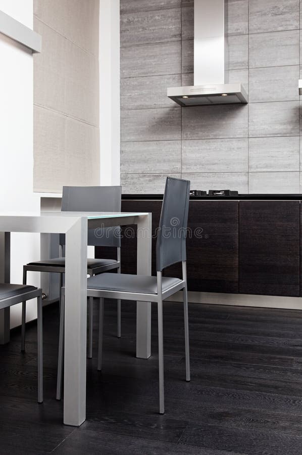 Fragment of modern minimalism style kitchen royalty free stock image