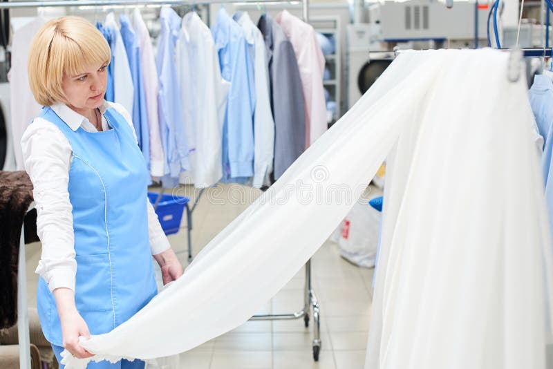 Girl worker Laundry looks and checks of white, sheer tulle royalty free stock image
