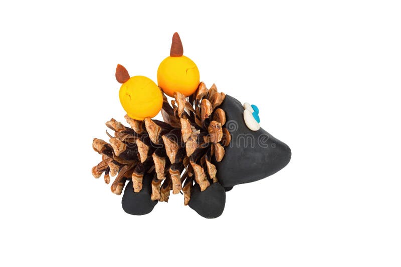Hedgehog from pine cone and plasticine. Stock image macro stock image