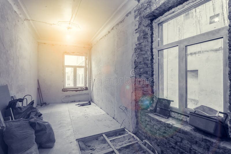 Interior of small room with plasterboard gypsum walls in apartment is under construction, remodeling, renovatio. Interior of small room with plasterboard gypsum royalty free stock photography