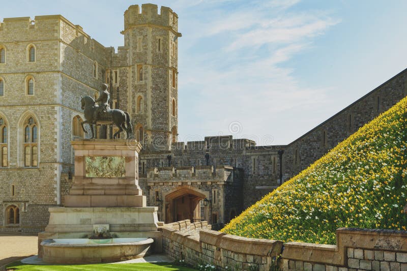 King Charles II Statue at The Upper Ward and The Quadrangle of Windsor Castle, a royal residence at Windsor, Berkshire, England. Windsor, UK - April 2018: King stock photos