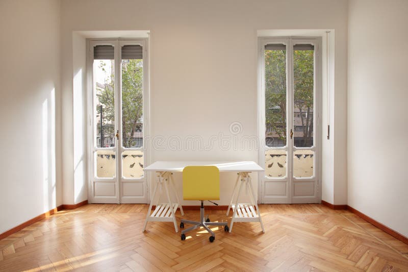 Modern new apartment room with desk royalty free stock photo