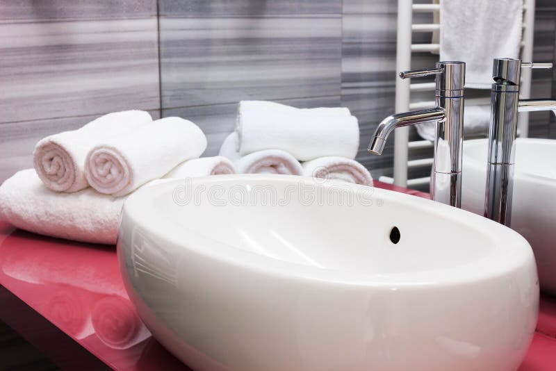 Modern oval sink in bathroom royalty free stock photos