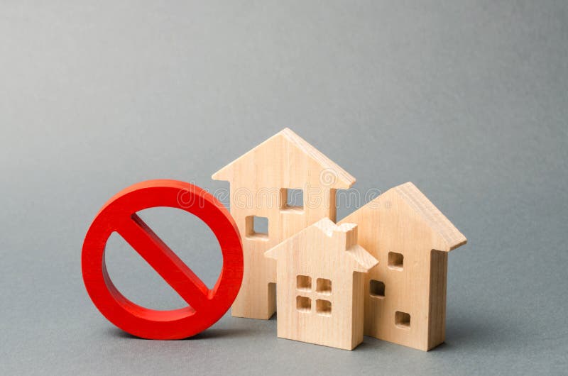 No Sign and the wooden house on an gray background. Inaccessible and expensive housing. Seizure and freezing of assets by a bank, royalty free stock photography