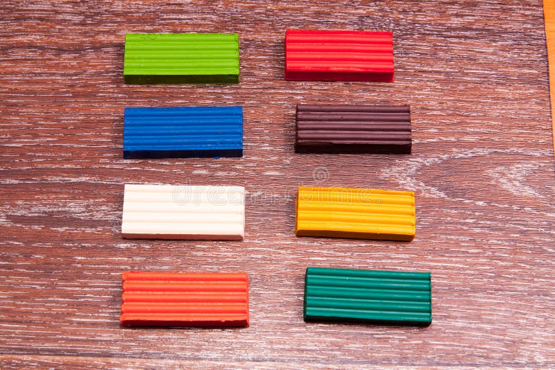 Photo children`s colored plasticine. Materials for creativity. Photo children`s colored plasticine on vintage background. Materials for creativity royalty free stock photography