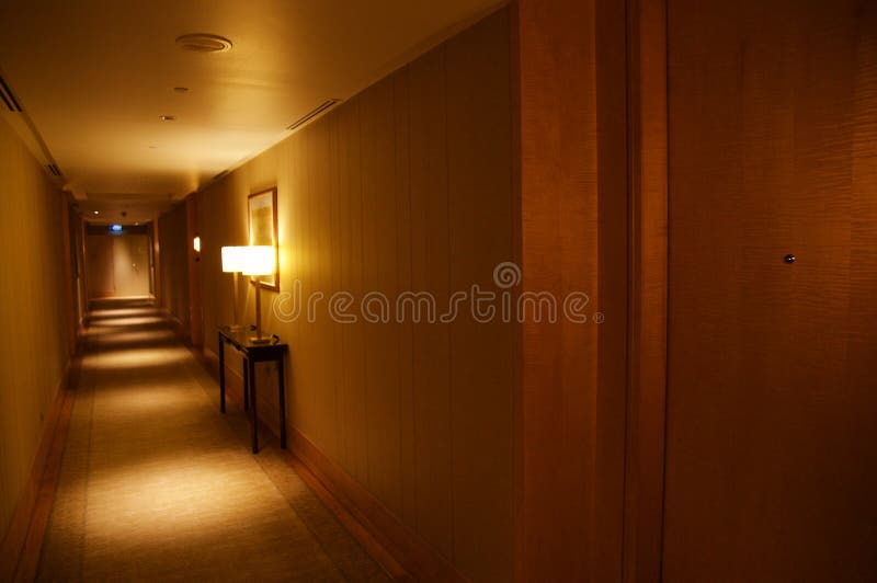 SINGAPORE - JULY 23rd, 2016: luxury Hotel corridor with modern interior, beautiful lighting royalty free stock photography