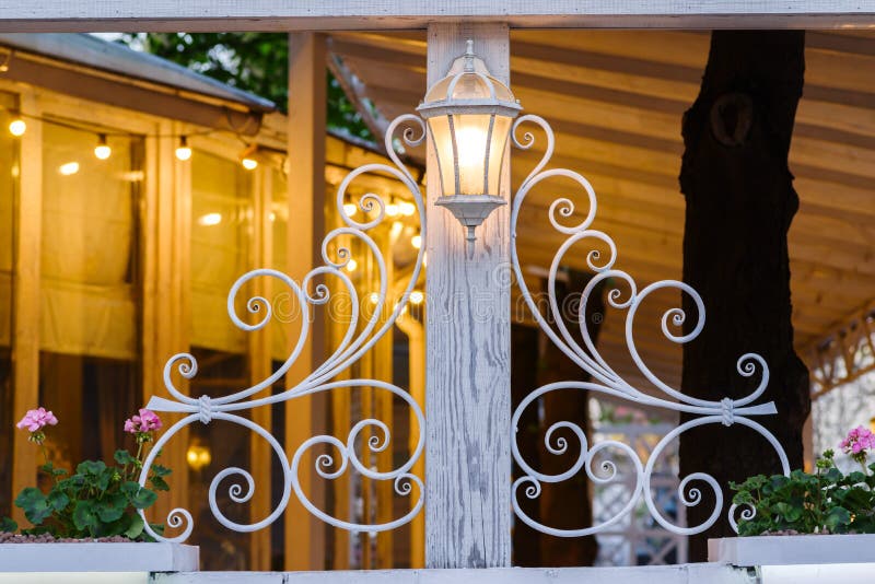Street lamp on the veranda with illumination royalty free stock photography