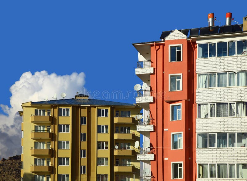 Two Apartment Buildings. Cloudy Sky royalty free stock photography