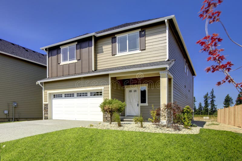 Typical American Northwest style new development house exterior. royalty free stock photos