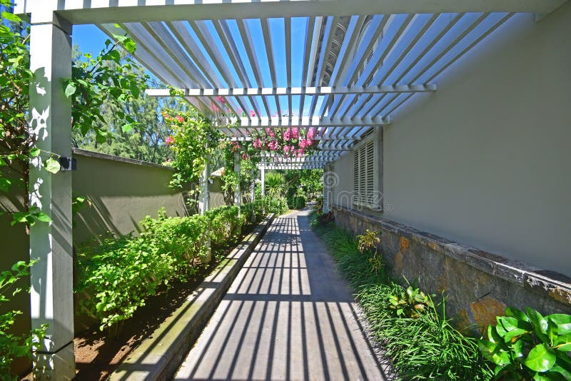 Walkway with veranda like semi open wooden rooftop stock images