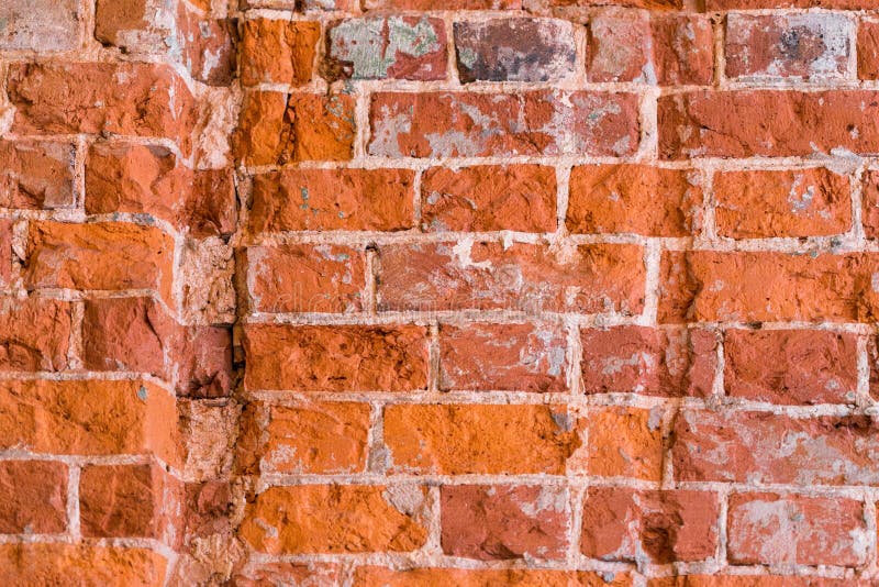 Wall of red brick. Interior decoration of the building stock image