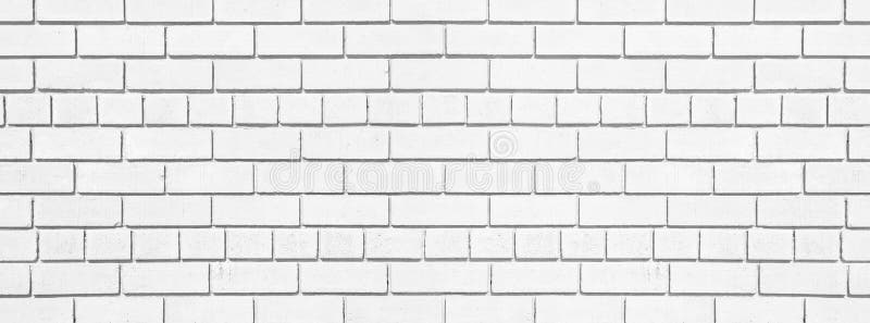 White brick long texture. Lime washed brickwork wide background. Light painted block wall backdrop. White brick long texture. Lime washed brickwork wide stock photo