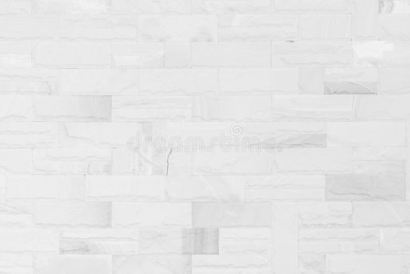 White brick wall art concrete or stone texture background in wallpaper limestone abstract paint to flooring and homework/Brickwork. Or stonework clean grid stock images