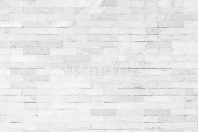 White brick wall art concrete or stone texture background in wallpaper limestone abstract paint to flooring and homework/Brickwork. Or stonework clean grid stock image