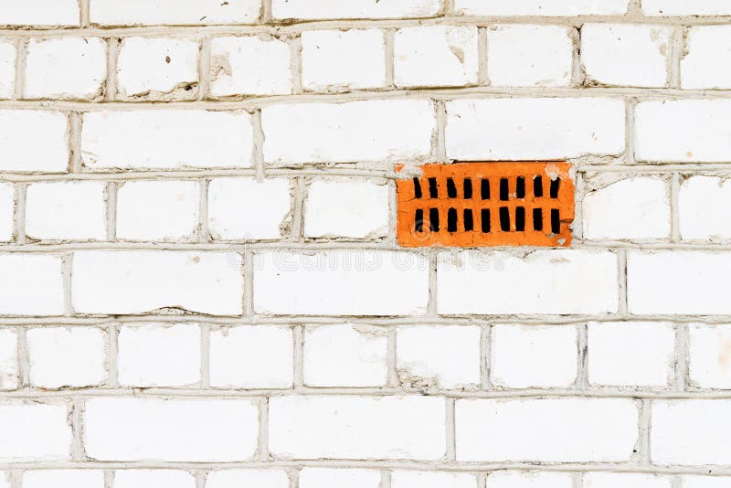 White silicate brickwork wall. With vent hole royalty free stock photography