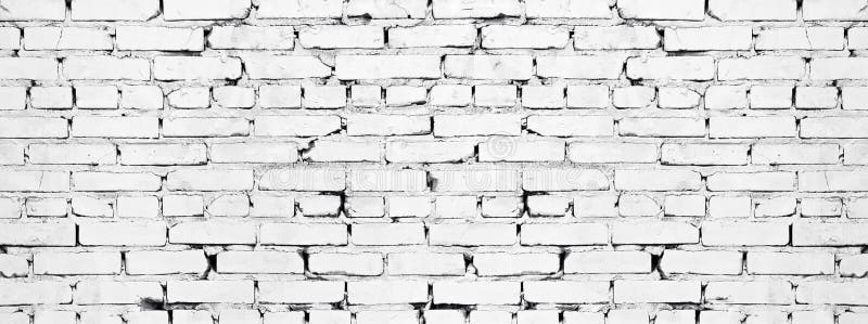 Wide white brick wall texture. Aged rough whitewashed brickwork. Grunge background. Wide white brick wall texture. Old rough whitewashed brickwork. Grunge royalty free stock photos