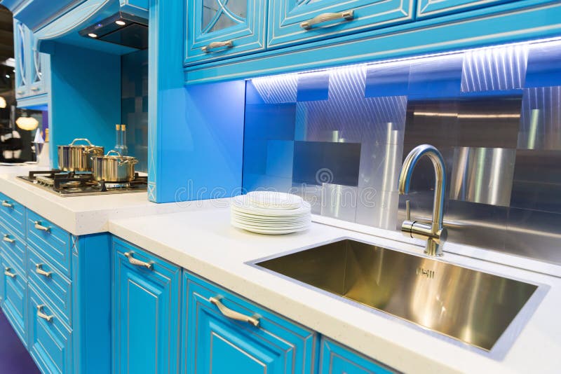 Wood beautiful custom kitchen interior design. Wood blue kitchen interior design high tech style royalty free stock photos