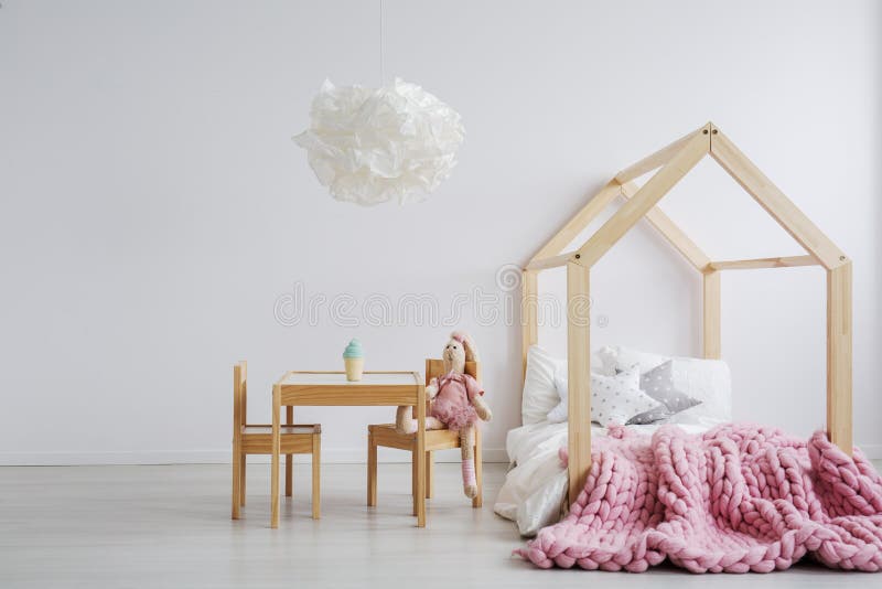 Wooden furniture for girl`s room. Simple but cute wooden furniture for girl`s room royalty free stock images